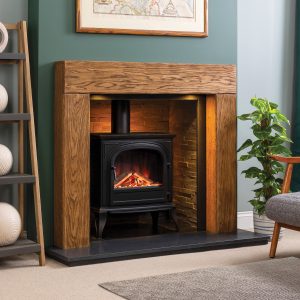 Smooth cast beam surround shown with electric stove, black granite hearth, and inglenook trim