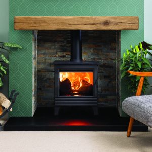 Character cast oak effect beam shown with slate effect chamber and granite hearth