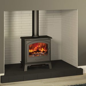 Ora 7 Electric Stove with black hearth and painted brick inglenook